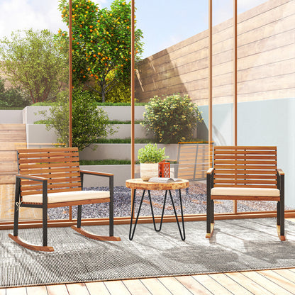 Outdoor rocking chair set of 2 with cream cushions and slatted backs