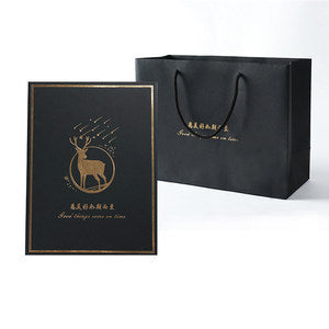 Black packaging box and bag with a deer logo on a white background