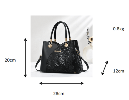 Black stone-pattern tote bag with top handles, gold hardware, and size measurements