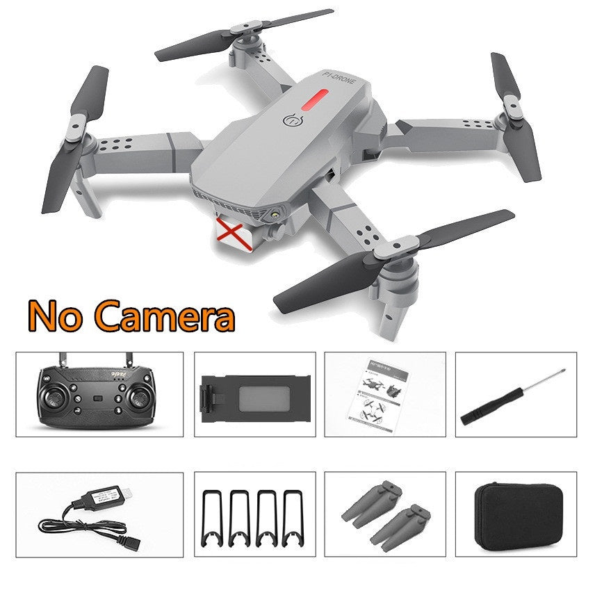 Folding quadcopter drone without camera, white body with four propellers and remote
