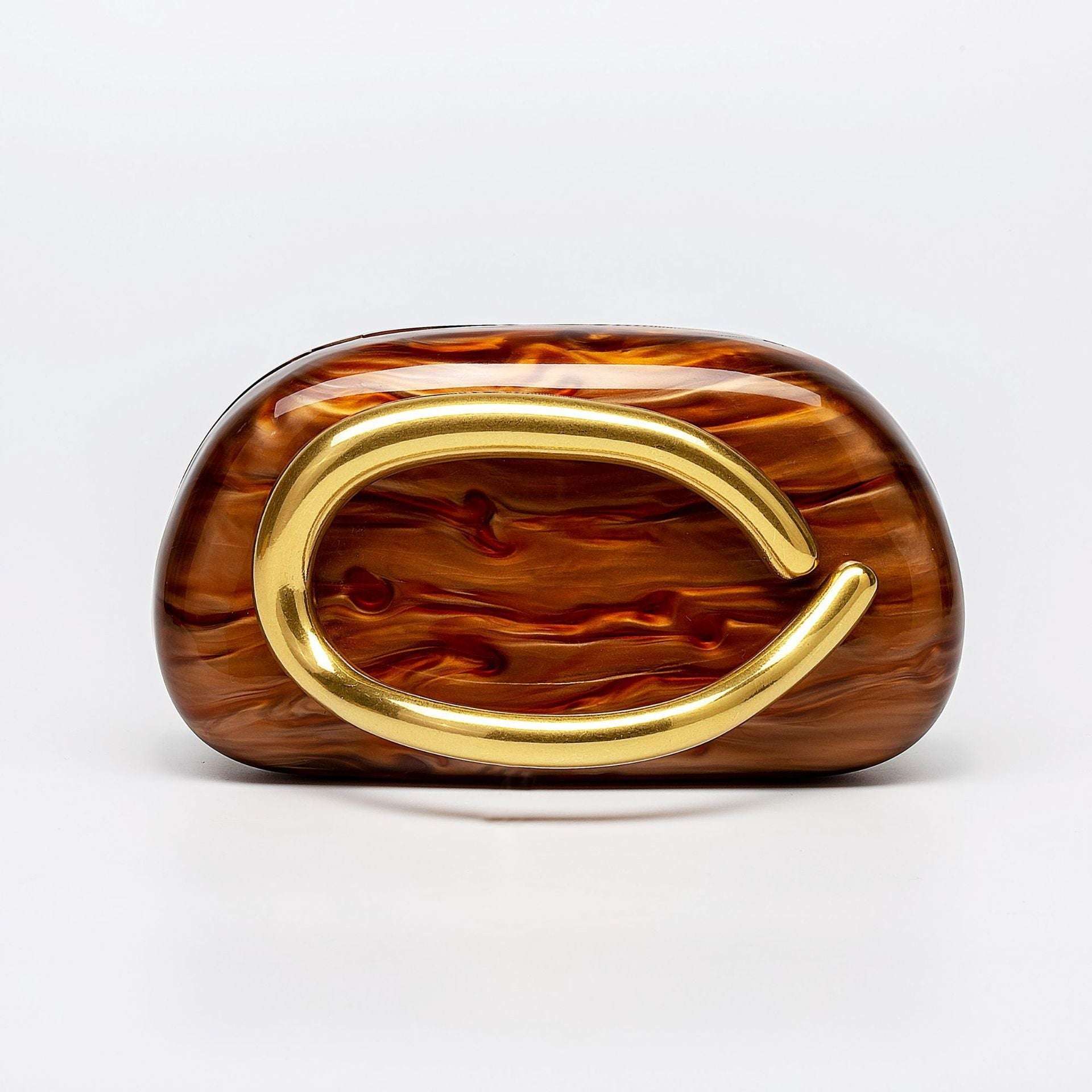 Brown acrylic dinner clutch with gold oval handle