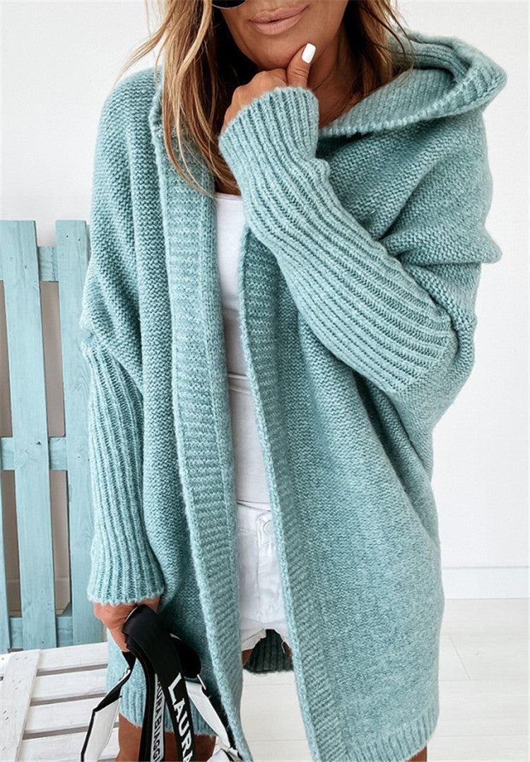 Teal oversized hooded cardigan sweater with batwing sleeves and ribbed knit texture