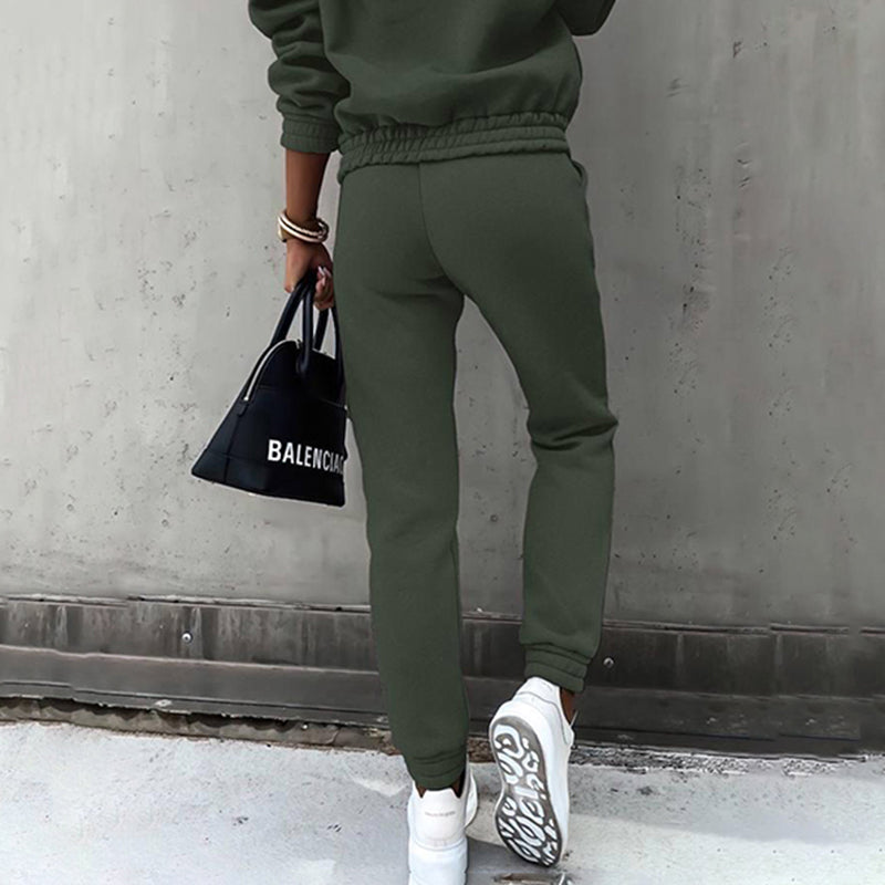 Two-piece casual tracksuit for women in dark green, jogger pants with elastic cuffs