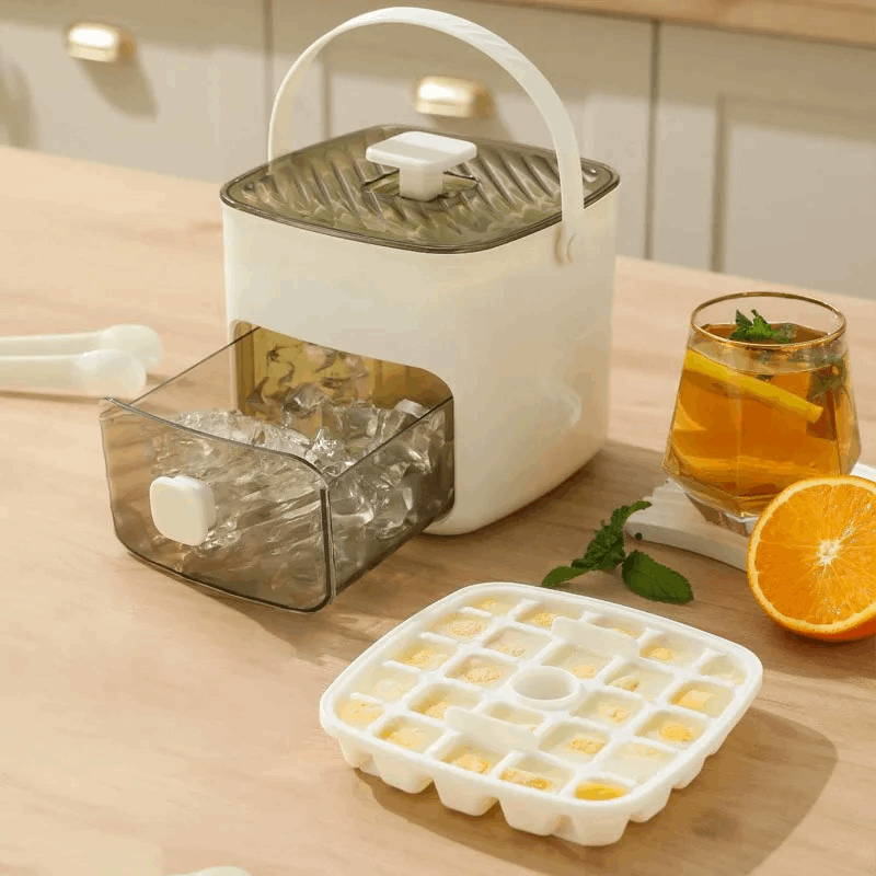 White ice cube mold tray with hinged lid and clear storage bin, plus ice-filled grid