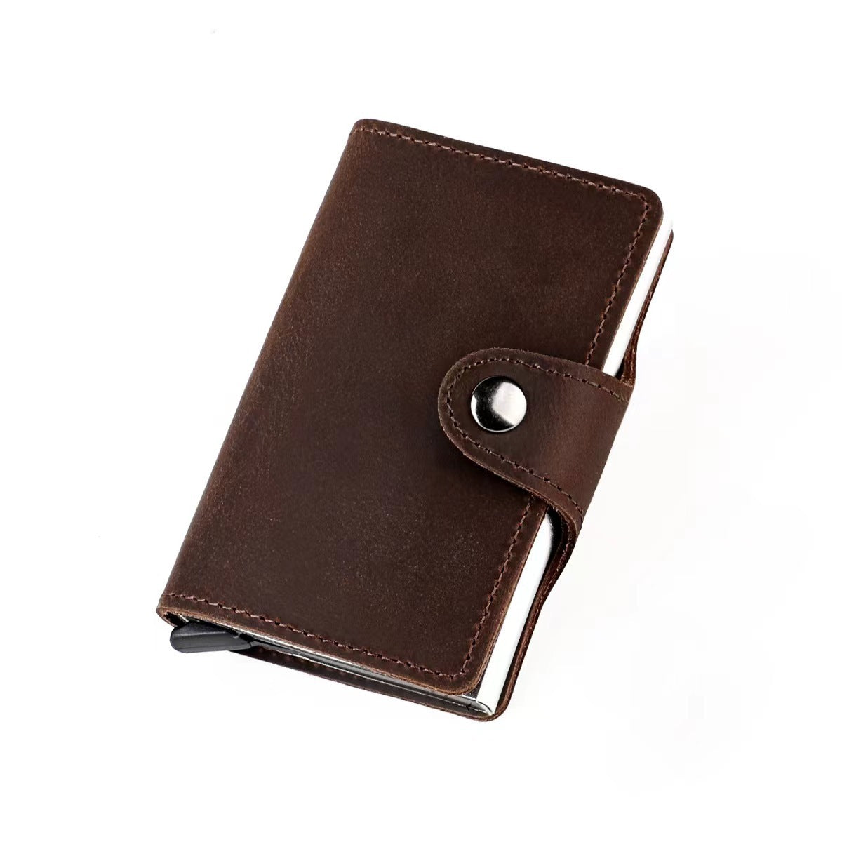 Brown leather card holder with flip strap and round metal snap, front angled view
