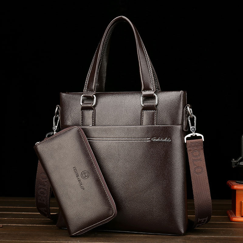 Men's leather one-shoulder computer bag with top handles and front zip pouch, brown tone.