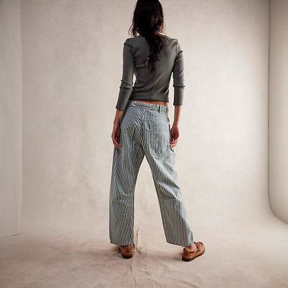 Blue-and-white striped wide-leg trousers with drawstring waist and patch pockets