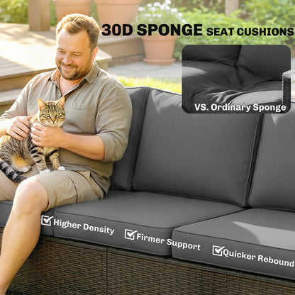 Outdoor sofa with dark wicker base and gray upholstered cushions, corner side view