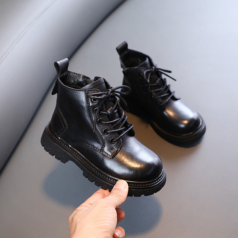 Children's black lace-up ankle boots with black laces and thick tread sole