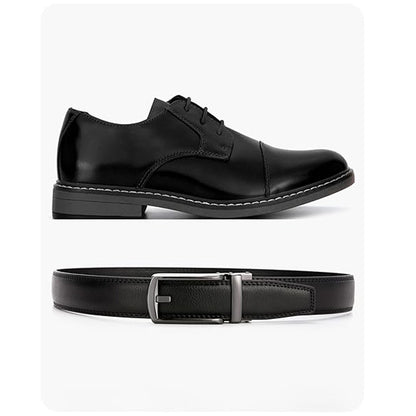 Boys black leather belt with snap closure and silver buckle, laid flat view.
