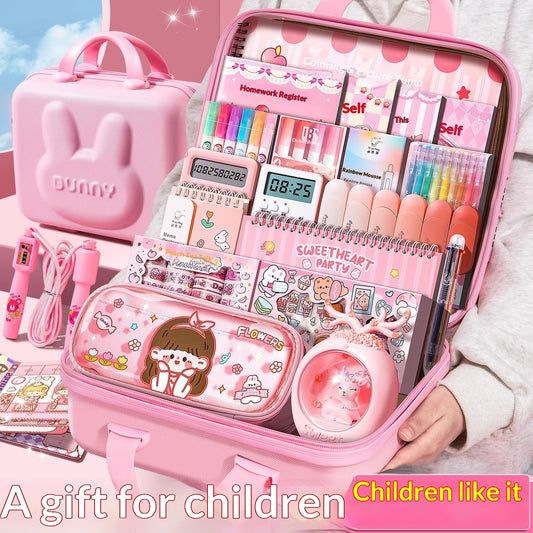 Pink stationery gift set box, open with colorful pens, stickers, and notebook pages