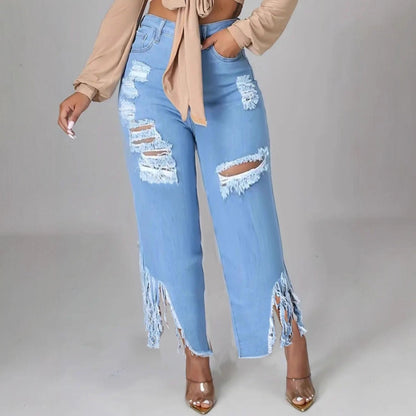 Light blue wide-leg distressed denim jeans with ripped knees and tassel fringe hems