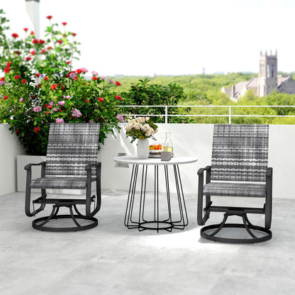 Two gray woven wicker swivel glider chairs with high backs and armrests on patio