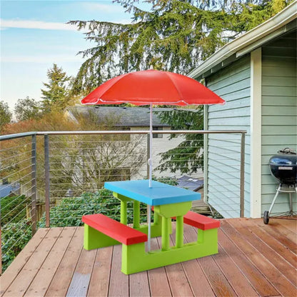 Kids picnic table set with red umbrella over blue tabletop, green frame, red benches