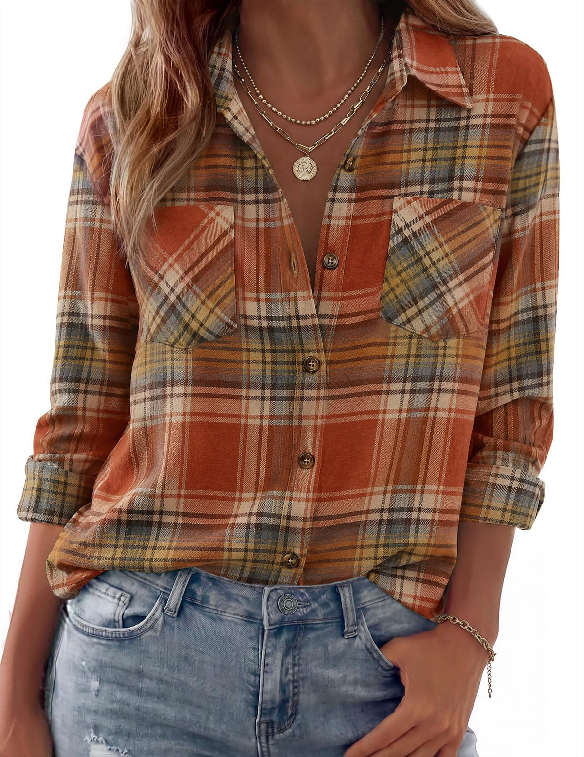 Loose-fit plaid button-up shirt in rust, tan, and dark brown checks with chest pockets