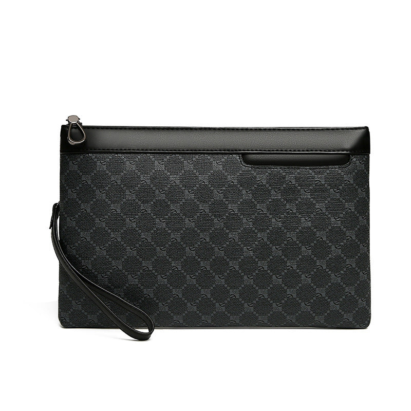 Black leather wristlet bag with dark patterned exterior, zip closure and wrist strap