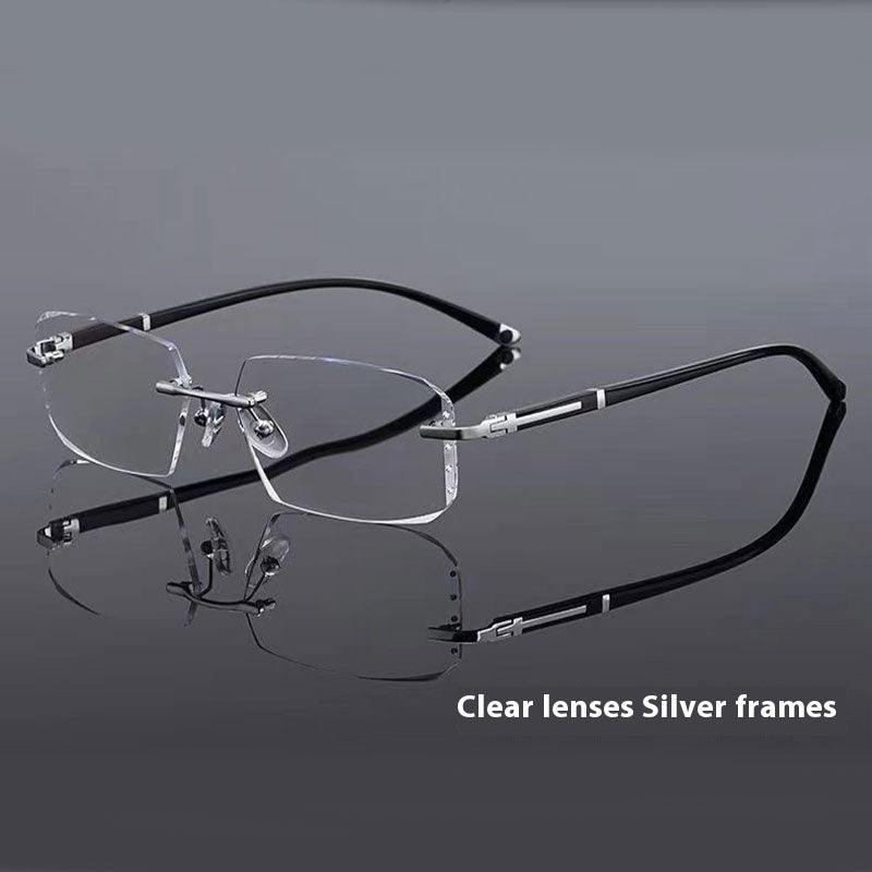 Black rimless reading glasses with clear lenses, silver bridge, and thin temple arms