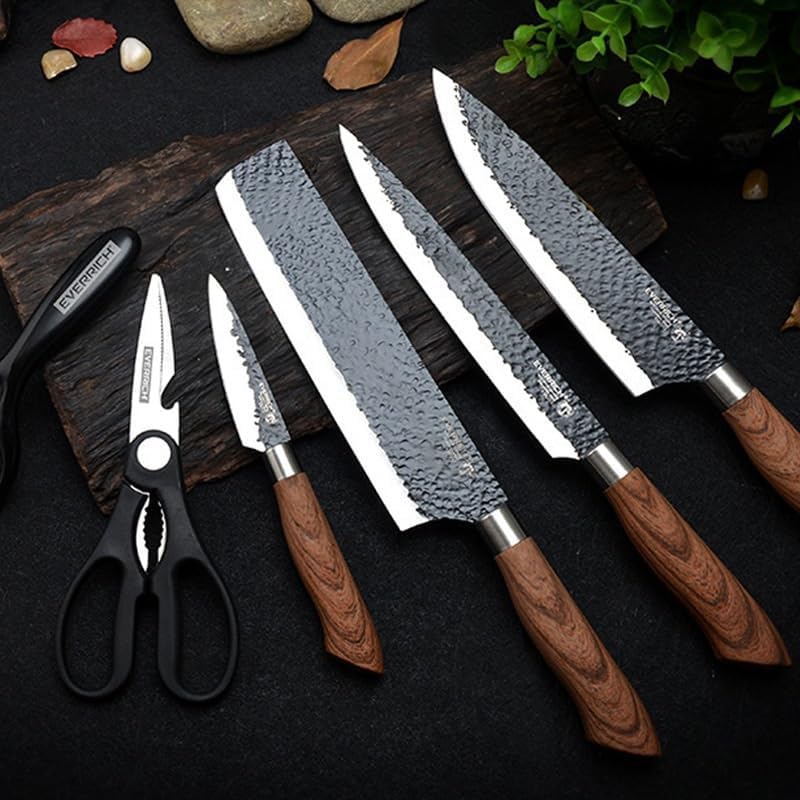 Wood-handled textured knives and black scissors arranged for display