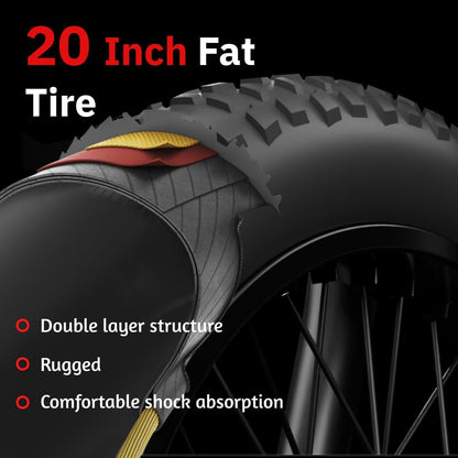 Close-up of 20 inch fat tire tread on a grey electric dirt bike