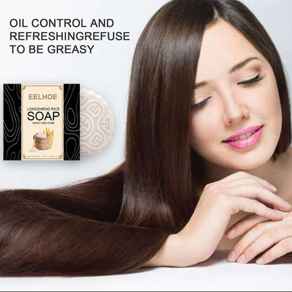 Woman with long hair and a box of Eelhoe soap on a white background