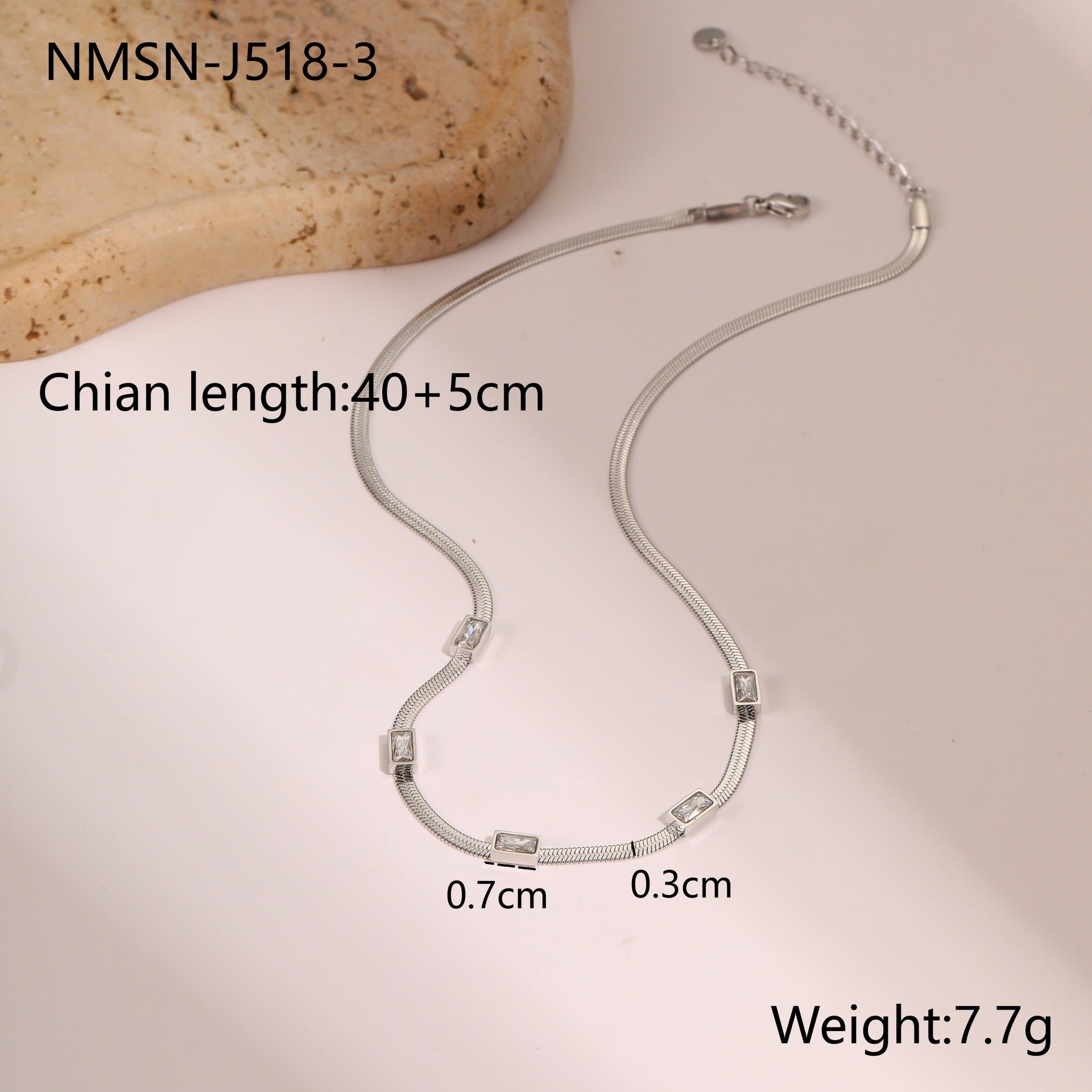 Silver-tone snake chain necklace with square zircon geometric links