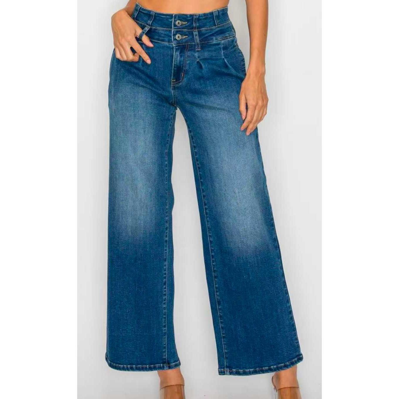 Women’s medium-blue denim jeans with front button closure and wide straight legs