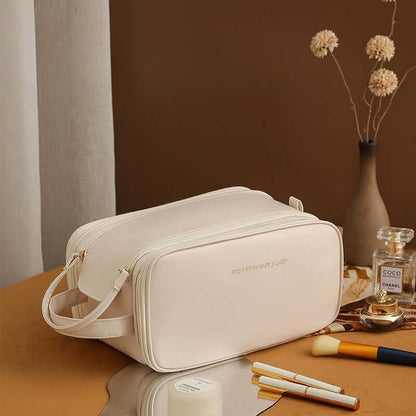 Three-layer double-zip cosmetic bag in white with top handle and front zipper pocket