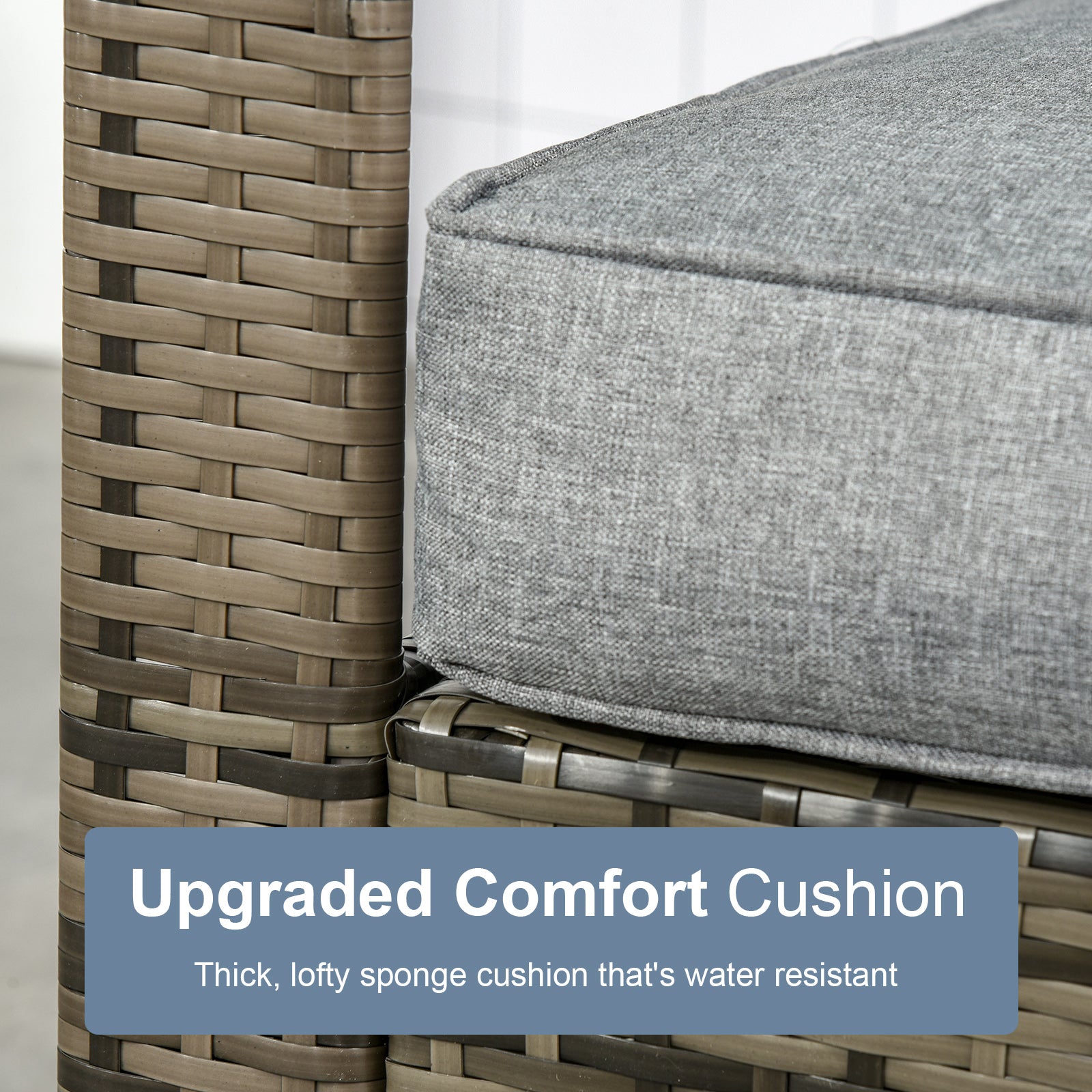 Gray patio chair cushion on woven resin wicker arm