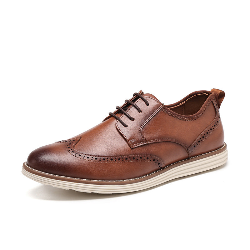 Brown leather lace-up oxford-style shoes with brogue detailing and cream sole