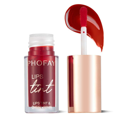 Lip tint bottle with red applicator over rose-gold cap tube and glossy red swatch.