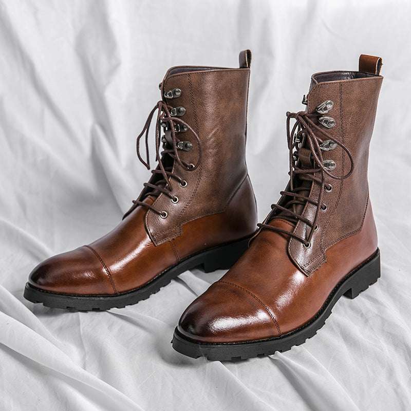 Brown lace-up mid boots with metal eyelets and dark chunky rubber sole