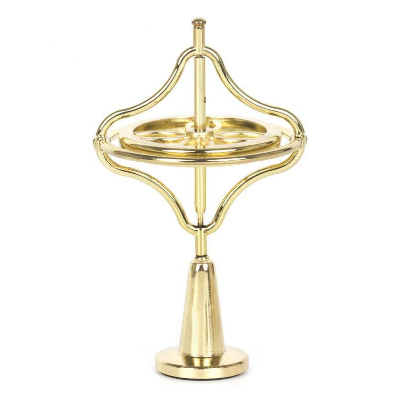 Gold finger gyroscope with cross-shaped frame and central spinning disc on base