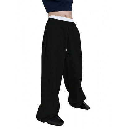 Men's black sweatpants with elastic waist and drawstring, relaxed straight legs
