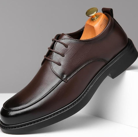 Men's brown leather lace-up oxford shoe with round toe and low stacked heel