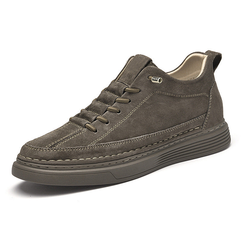Gray suede lace-up board shoes with thick rubber sole and padded collar lining