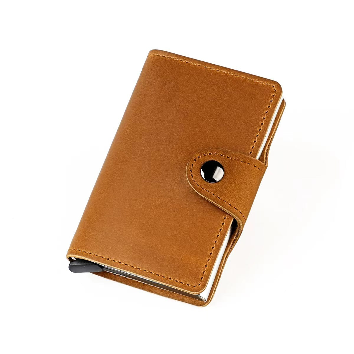 Tan leather card holder with flip strap and round metal snap, front angled view