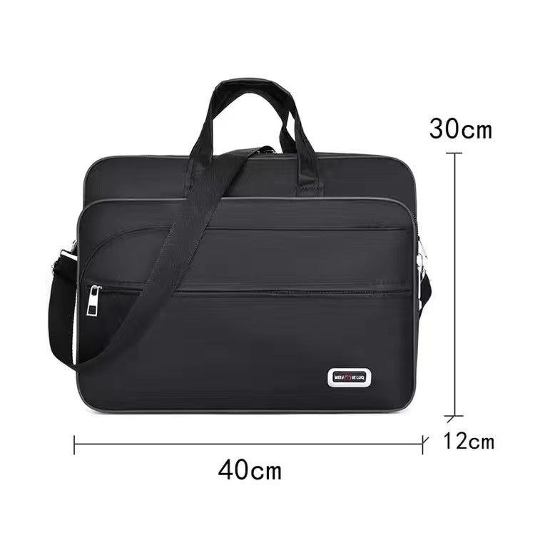 Black laptop bag with smooth front panel and side zip pocket on the left