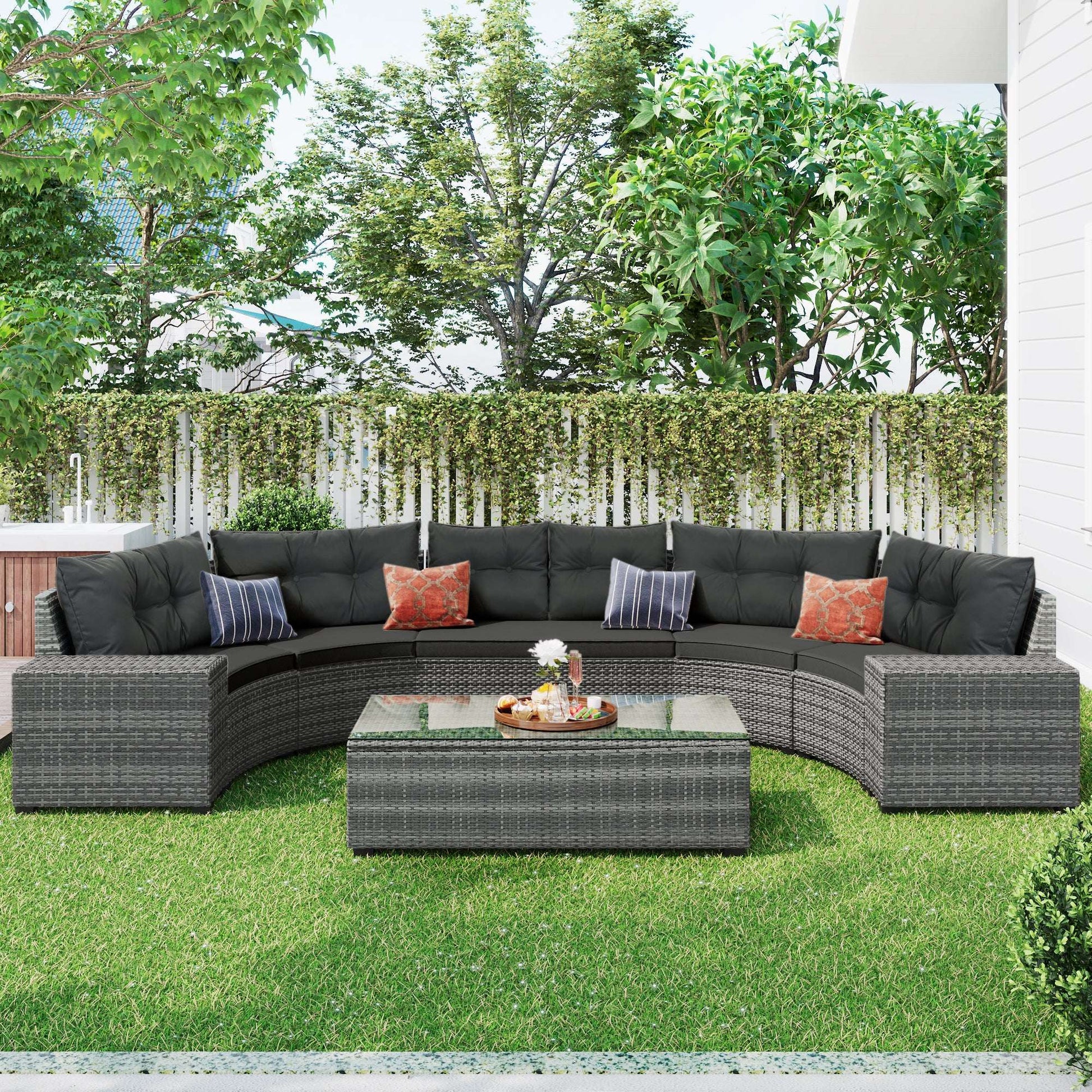 Gray outdoor wicker sectional sofa set with tufted cushions and corner bench layout