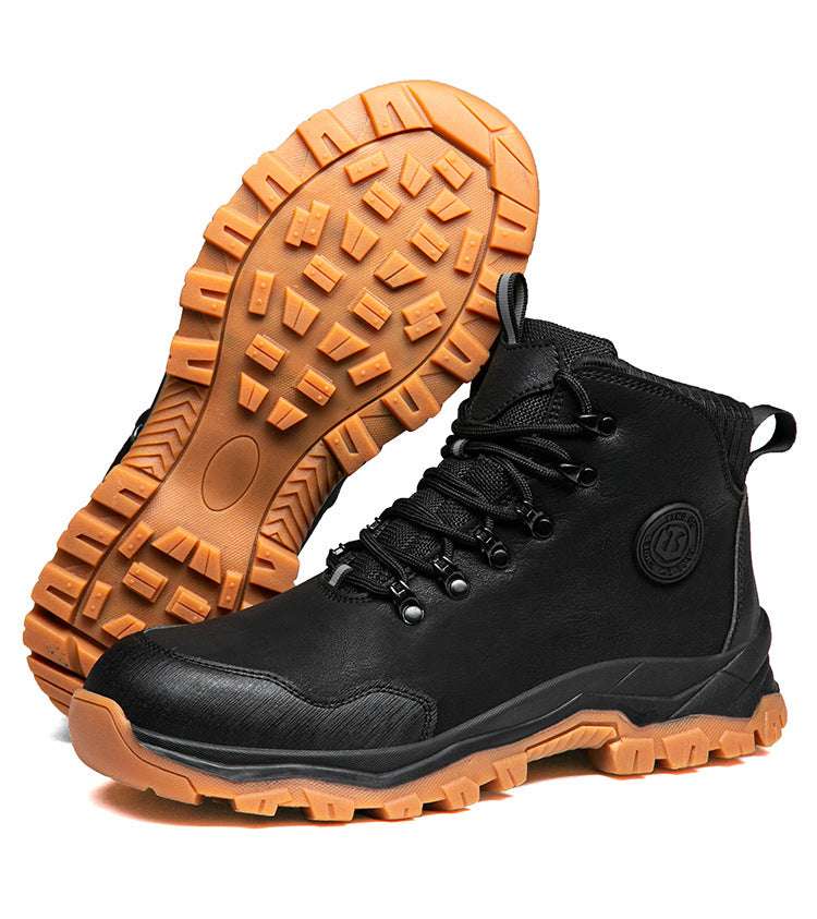 Black steel-toe safety boot with orange outsole, laces, and side stitching.