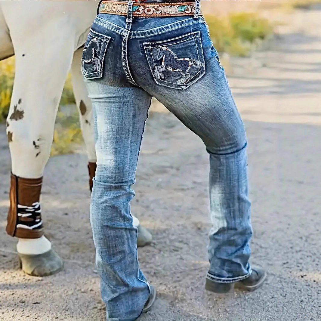 Light blue straight-leg jeans, back view with embroidered pocket graphic on denim