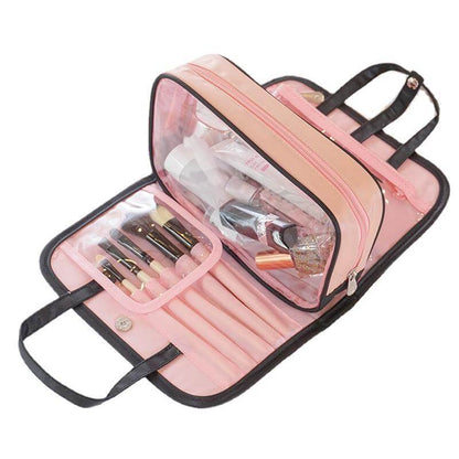 Cosmetic storage bag open to reveal compartments with tools in clear zip pouch, pink.