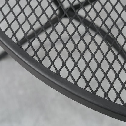 Black metal wire mesh detail on tabletop edge and curved support bar