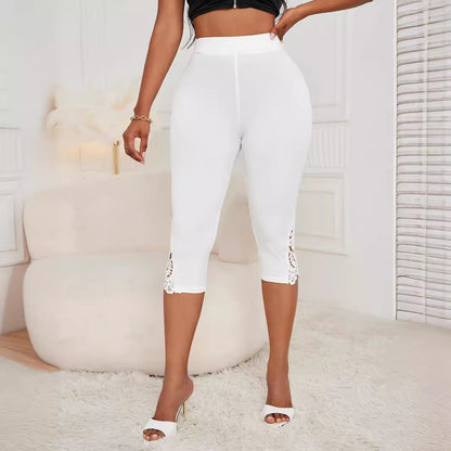 Women's high-waist lace patchwork cropped pants, white, back view with lace-trim cuffs