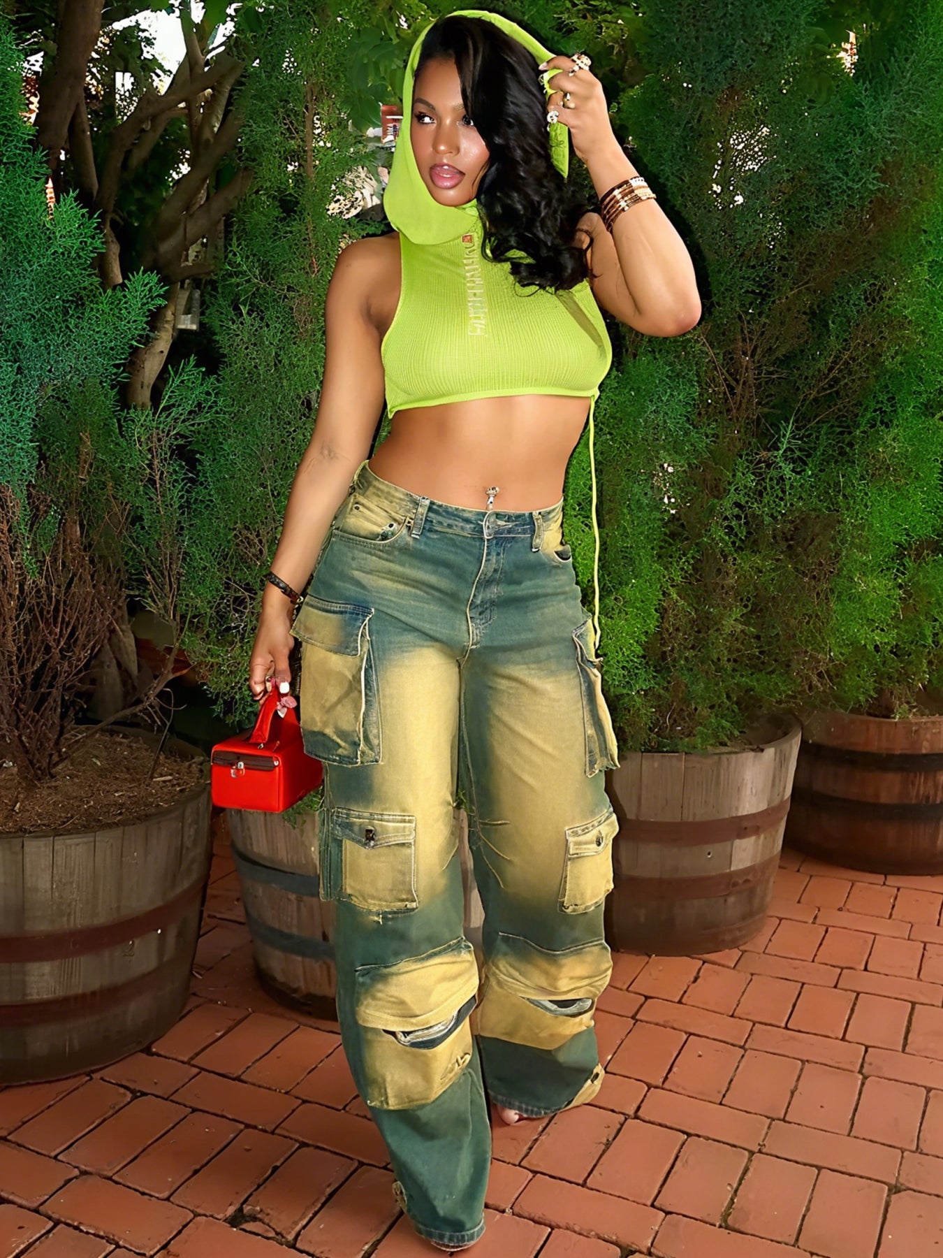 Green loose workwear jeans with patchwork cargo pockets and worn, distressed wash