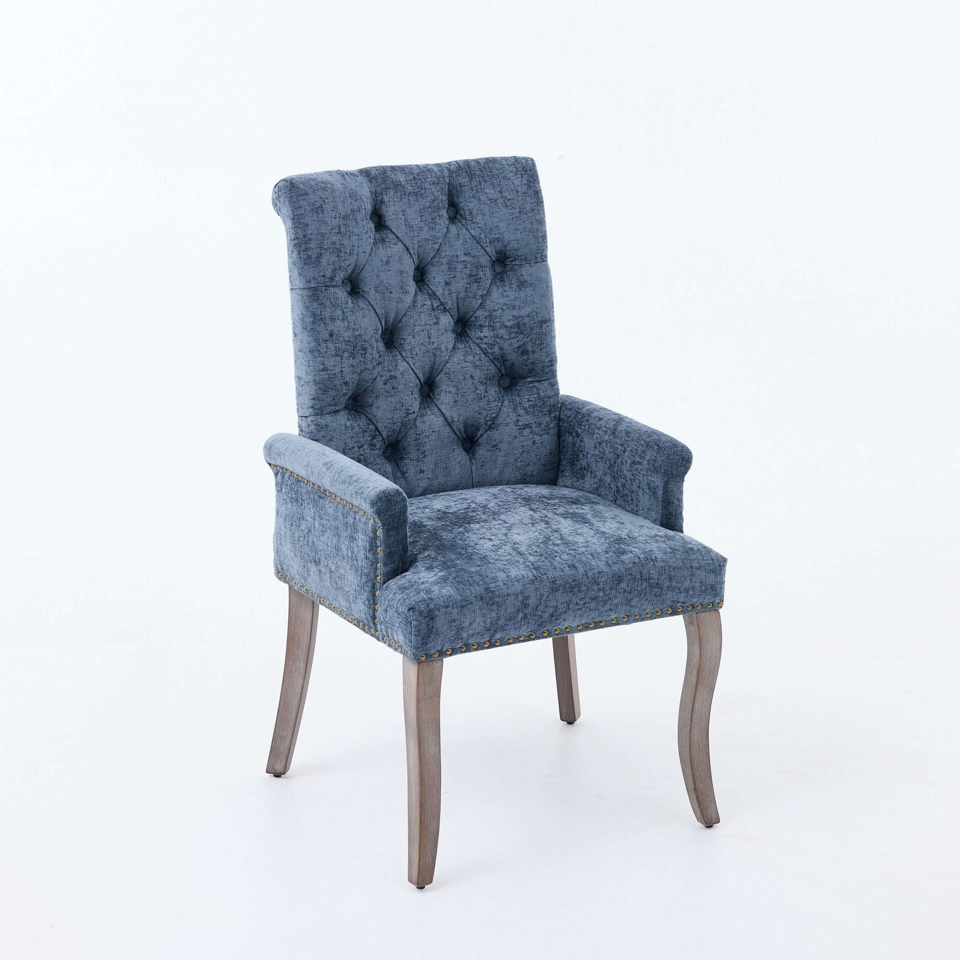 Blue chenille upholstered dining chair with tufted back and padded arms, angled view