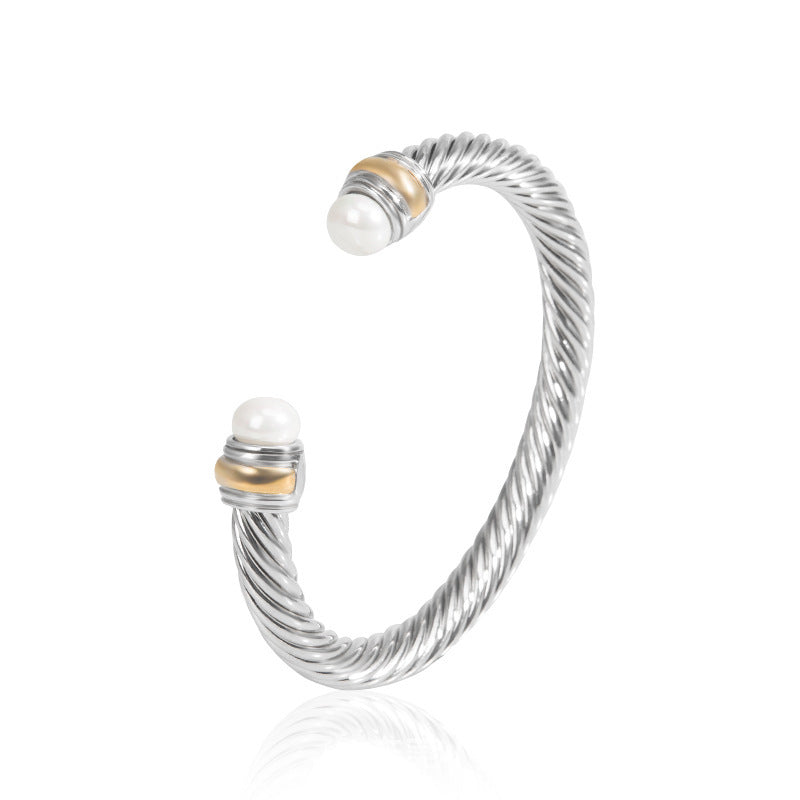 Bohemian bracelet with silver wire and white pearl-like bead caps with gold accents