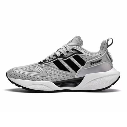 A pair of men's sneakers with a mesh upper featuring stripes in white, gray, and black colors, and a rubber sole.