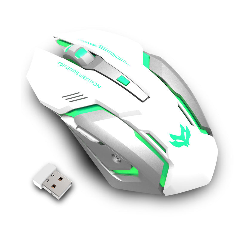Wireless gaming mouse with blue LED lights, placed on a laptop, with a charging USB dongle beside it.