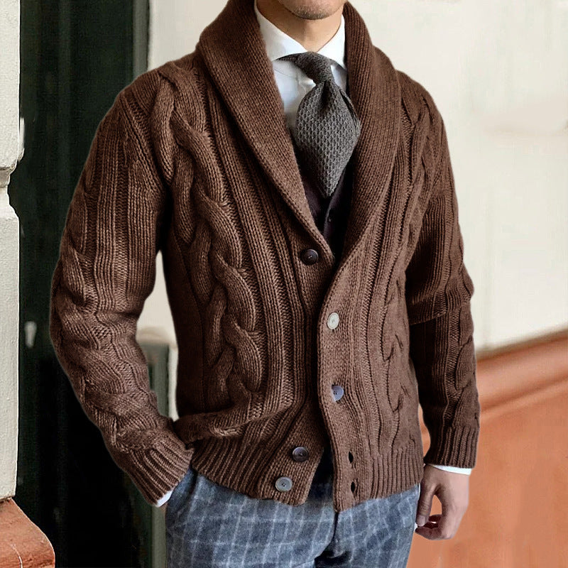 Brown cable-knit cardigan with shawl collar, button front, and long sleeves