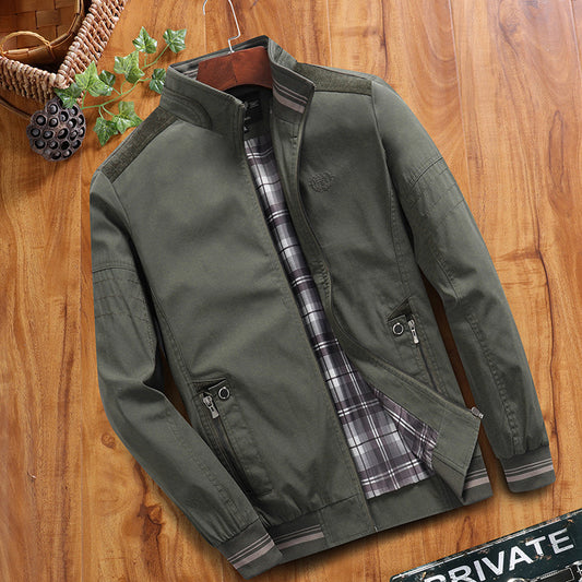 Green jacket with plaid lining on a wooden surface
